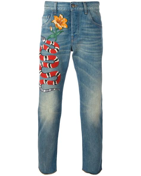 pantaloni gucci serpente uomo|gucci jeans net a porter.